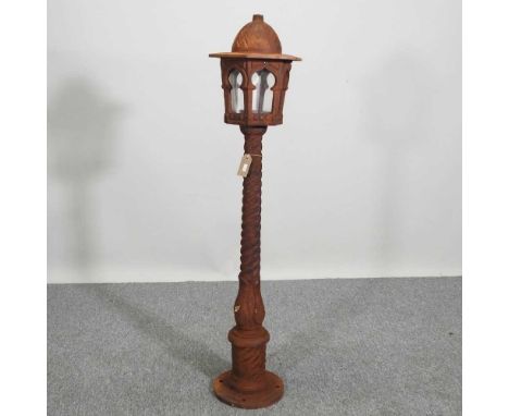 A rusted iron garden lamp post, with a twisted column, 125cm high