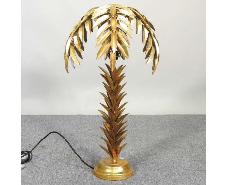 A gilt metal table lamp, in the form of a palm tree, 80cm high