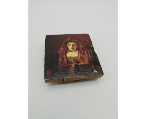 A hand painted portrait of a lady upon wood, signature to the corner (5.5x6cm) 