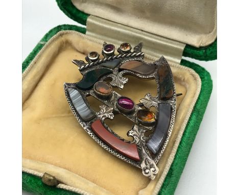 A Victorian Silver Luckenbooth brooch, set with agate, citrine and ruby stones. 