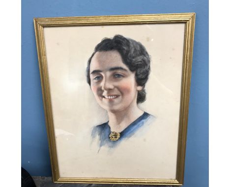 An antique watercolour portrait of a lady. Frame measures 41x33cm 
