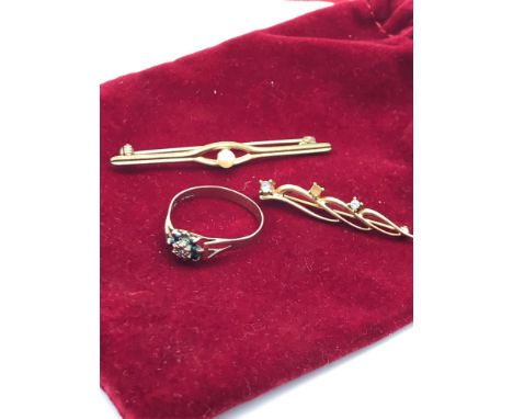 A 9ct gold ladies ring together with 2 costume brooches. 