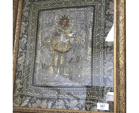 An Early 19th century possibly earlier, tapestry religious icon, Face and hands are hand painted, Hand stitched with gold and
