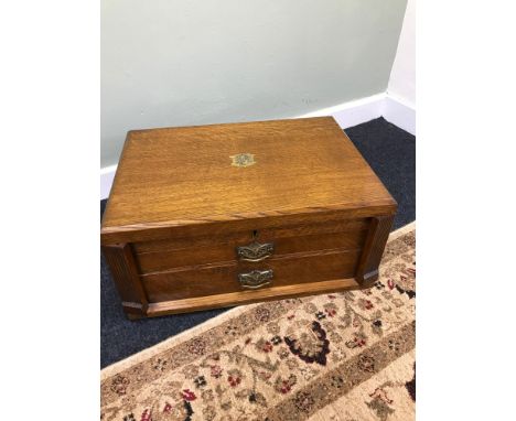 An Antique solid light oak cutlery chest, Filled with James Deakin &amp; Sons Cutlery Sheffield. Chest has lift up top with t