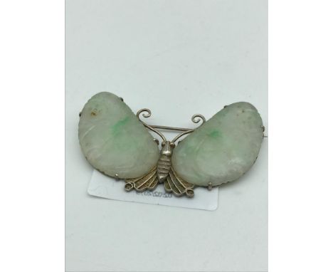 An Oriental silver butterfly set with a pair of Mutton fat jade wings. 