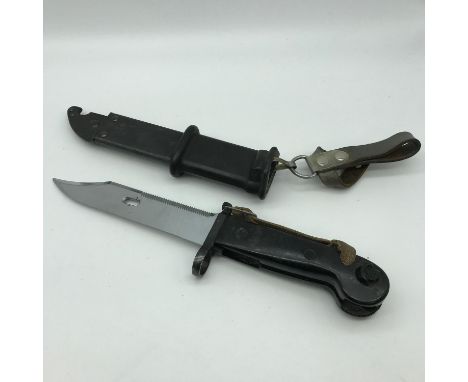 Military knife and scabbard. 