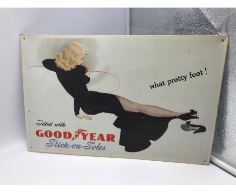 A Vintage Good Year Stick on soles pin up advertising tin/ metal sign. Measures 26.5x41cm 