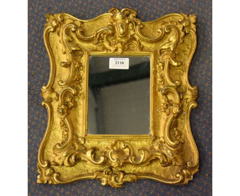 A 19th Century giltwood and gesso portrait miniature frame with later inset mirror, approx 37cm x 31cm.