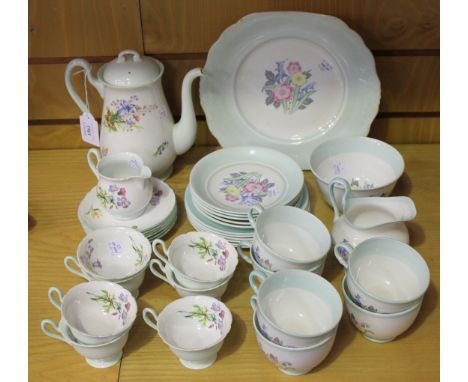 A Shelley bone china 'Wild Flowers' pattern part coffee service, comprising coffee pot and cover, cream jug, seven cups and s