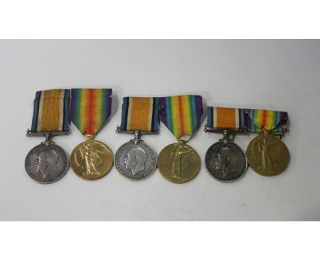 Three 1914-18 British War Medal and 1914-19 Victory Medal pairs to 'K.30811 J.W.White. Sto.1 R.N.', '25334 A.Cpl. P.E.Tickner
