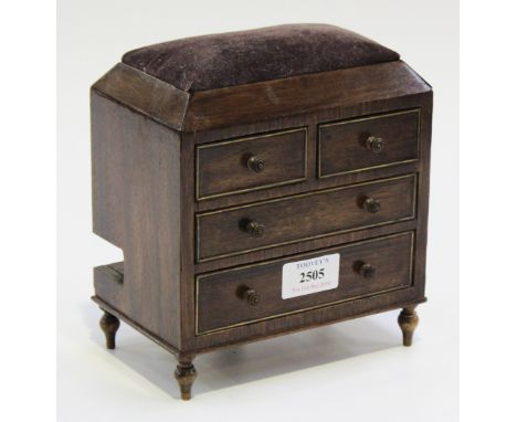 A 19th Century and later rosewood needlework chest, the top inset with a pin cushion above four small drawers, the back fitte