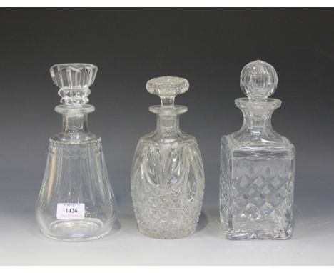 A Baccarat cut glass decanter and stopper, of pear form, height approx 24cm, a cut glass decanter and stopper of barrel shape