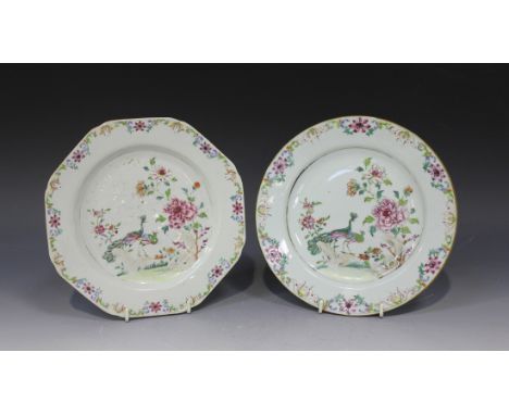 A Chinese famille rose export porcelain plate, Qianlong period, painted with two peacocks beside peony, within a flower and f