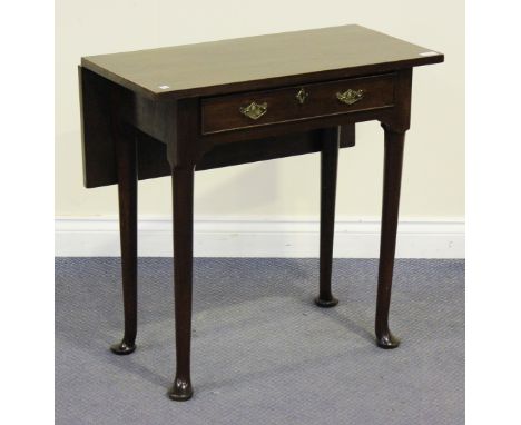 A George III and later mahogany drop-flap side table, fitted with a single drawer, raised on turned legs and pad feet, height