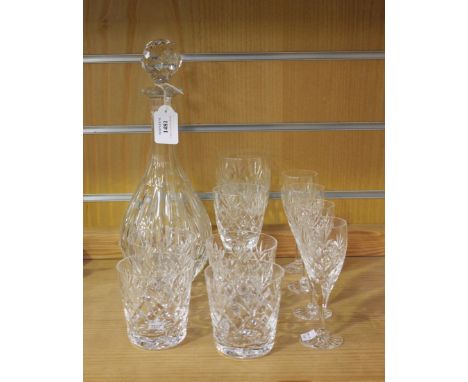 A collection of Royal Doulton glassware, comprising decanter and matched stopper, of mallet form with facet and slice cut dec