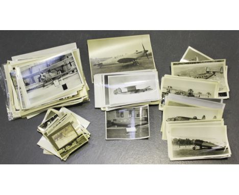 A collection of photographs, circa 1920-1960, mainly of piston-engine aircraft, including Spitfire, Lockheed Lightning and Ch