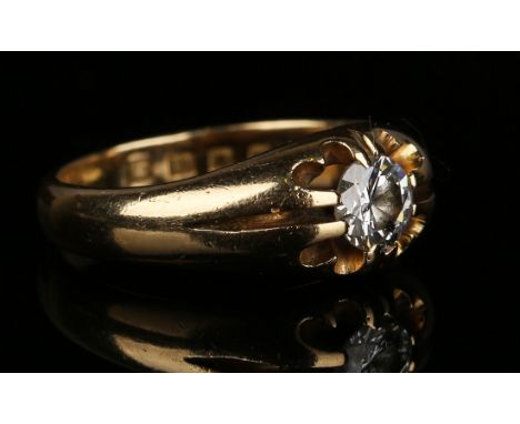 An 18ct gold and diamond single stone ring, claw set with a circular cut diamond, London 1929, ring size approx K1/2.