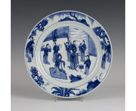 A Chinese blue and white porcelain circular dish, mark of Chenghua but Kangxi period, the centre finely painted with a dancer