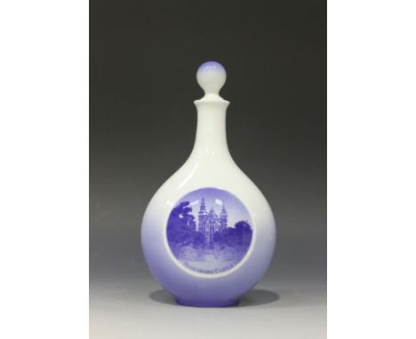 A Royal Copenhagen porcelain decanter and stopper, circa 1954, the flattened circular body decorated with a scene of 'Rosenbo