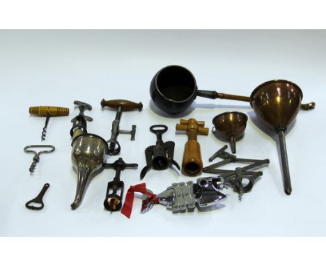 A quantity of various corkscrews, including a steel open barrel corkscrew, marked 'The Challenge', an Argentinian corkscrew, 