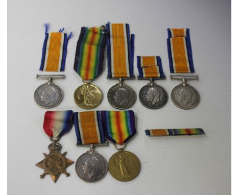 Three First World War medals, comprising a 1914-15 Star (the naming erased), a 1914-18 British War Medal and a 1914-19 Victor