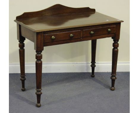 A Victorian mahogany side table, fitted with two short drawers, raised on turned legs, height approx 81cm, width approx 91cm.