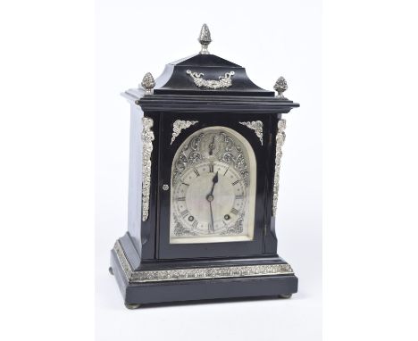 A Winterhalder & Hofmeier German late 19th Century ebonised bracket clockThe architectural casing with tapered bell form uppe