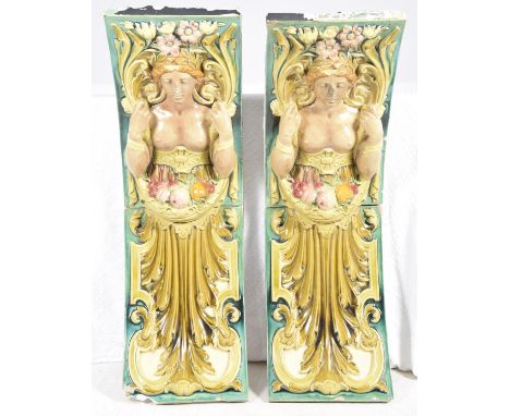 An unusual pair of Majolica architectural wall plaques, late 19th/ early 20th centuryEach of concave form cast in relief with
