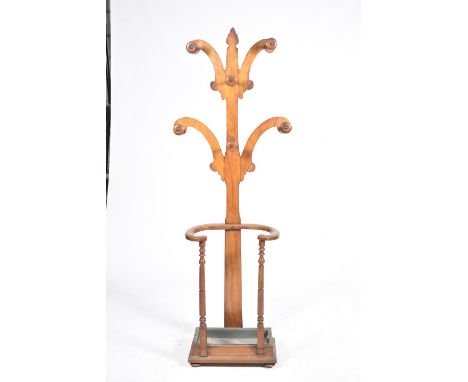 A Victorian mahogany tree form hall standThe stand with four graduated branches, each applied with turned spindles above a cu