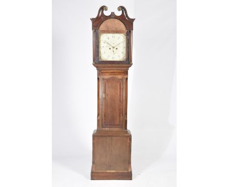 An early 19th Century oak and mahogany cross banded long case eight day clock by W Wain, AlfretonHaving a 36cm painted break 