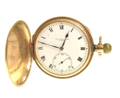 A 9ct gold hunter pocket watch by Thos Russell & SonThe circular white enamel dial with roman numeral hour markers and subsid