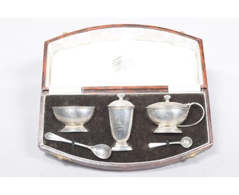 Four cased sets of silver cutlery Including Christening set of spoon and fork, cased coffee spoons, knives, and sugar sifter,