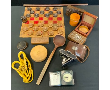 An equestrian showing cane;  a treen ladle;  various boxes;  a Decker Compur camera;  draughts and board;  etc 