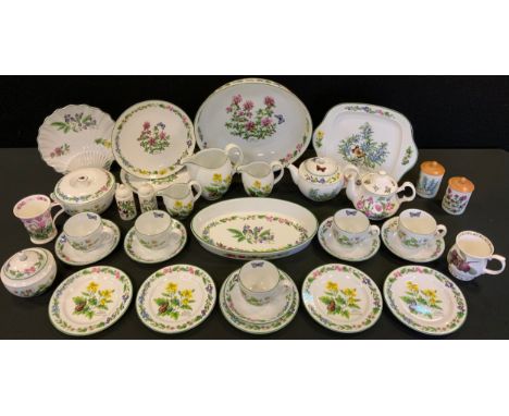 A Royal Worcester Herbs pattern part tea service, and kitchenware, comprising five tea cups, saucers, side plates,  including