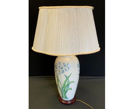 A contemporary lamp and shade 