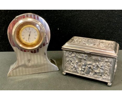 A silver cased dressing table timepiece, engine turned stripped case, Birmingham 1920;  plated casket box (2) 