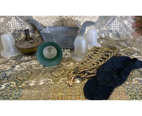 A Oriental rectangular lead vessel, outswept handles, engraved and mounted with two character symbols, with in floral surroun