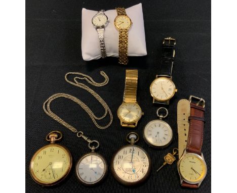 A continental silver open faced pocket watch;  another;  a gold plated pocket watch;  a Railway Regulation pocket watch;  two