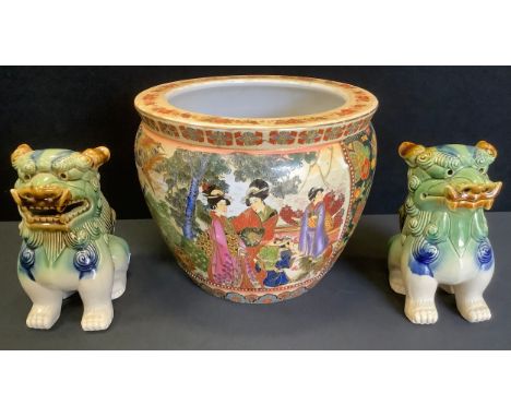 A Japanese fish bowl planter, decorated with tradition scenes and flowers, 25cm high, 31cm diameter;  a pair of Shi Shi guard