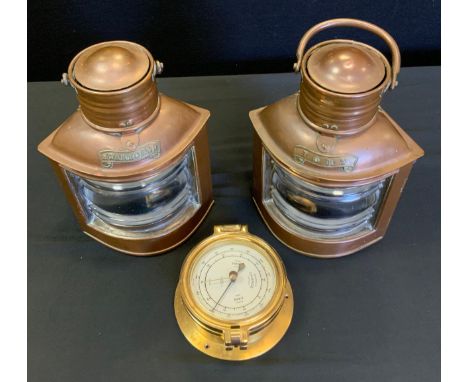 A pair of miniature ships lanterns, Port and Starboard, 22cm high;  bulkhead barometer, 11cm diameter (3) 