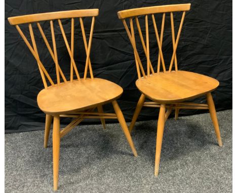 A pair of Ercol stick back Shalstone dining chairs 