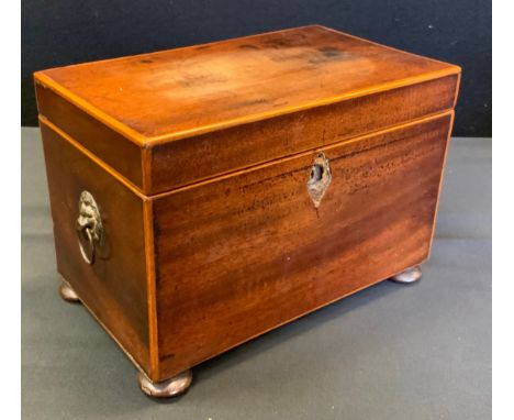 A 19th century mahogany rectangular tea caddy, two lidded compartments, 19cm wide, c.1800 