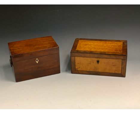 A 19th century mahogany rectangular tea caddy, the interior with two lidded compartments, loose ring handles to sides, 13.5cm