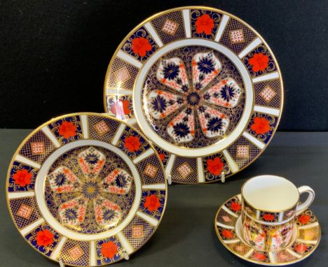 A Royal Crown Derby 1128 Imari plate, 21.5cm diameter, coffee can saucer and side plate, all first quality  (4) 