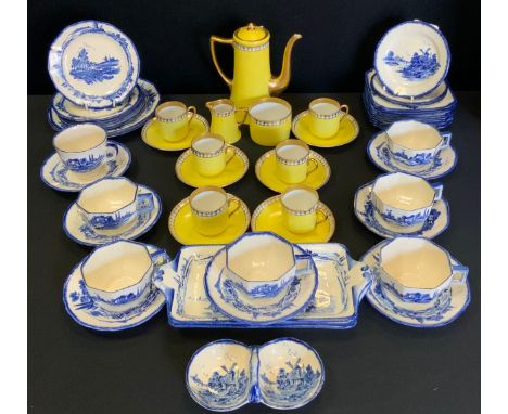 A Royal Doulton Norfolk pattern tea set;  yellow coffee set 