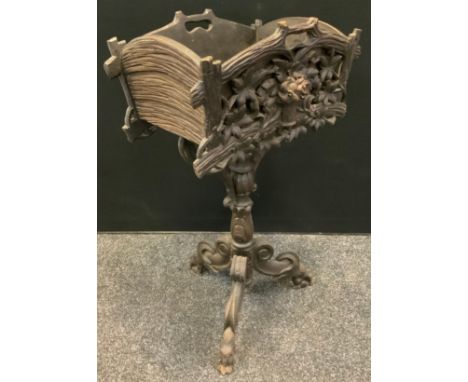 A late 19th century Black Forest planter, carved front, shaped rectangular top, shaped column, tripod feet, c.1880 