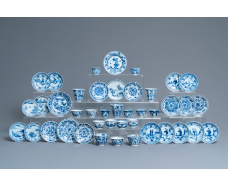 Full title: Twenty-one Chinese blue and white saucers and eighteen cups, KangxiDescription:Dia.: 13,5 cm (the largest saucer)