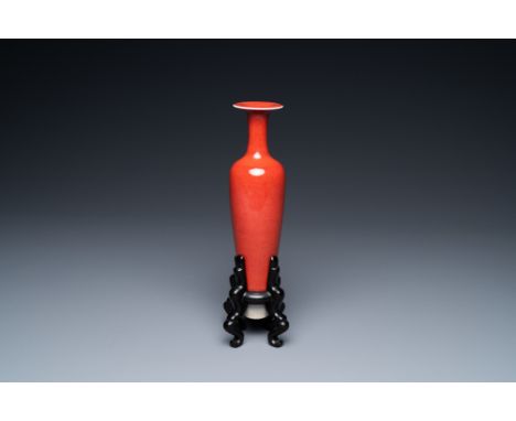 Full title: A Chinese slender 'peach bloom'-glazed vase, Kangxi mark but probably laterDescription:H.: 20,5 cm (incl. stand)H