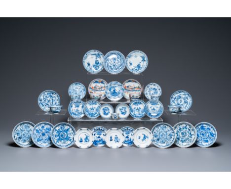 Full title: Twenty-seven Chinese blue and white saucers and seven cups, Kangxi and laterDescription:Dia.: 12,5 cm (the larges