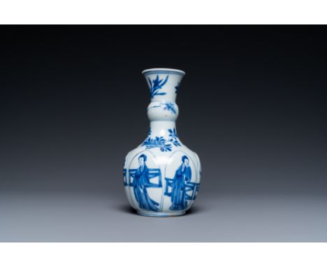 Full title: A Chinese blue and white lotus-molded vase, KangxiDescription:H.: 14 cmThe absence of a condition report does not